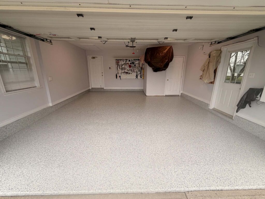 Finished 400 sq ft polyurea garage floor coating with Tidal Wave flake in Dartmouth, Nova Scotia