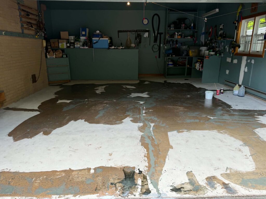 Concrete repairs and resurfacing on a damaged garage floor slab in Sackville, Nova Scotia
